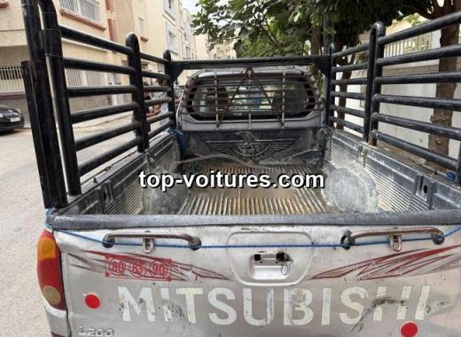 Mitsubishi L200 2009 — photo 3